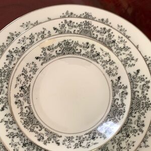 Noritake complete place setting - one small chipped piece.
